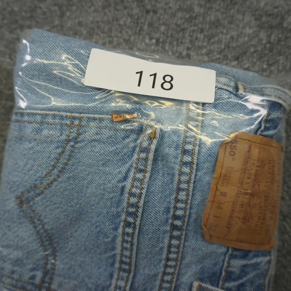 Vintage Levis 550 Relaxed Fit Tapered Mens Light Wash Orange Tab Jeans 34x32 90s